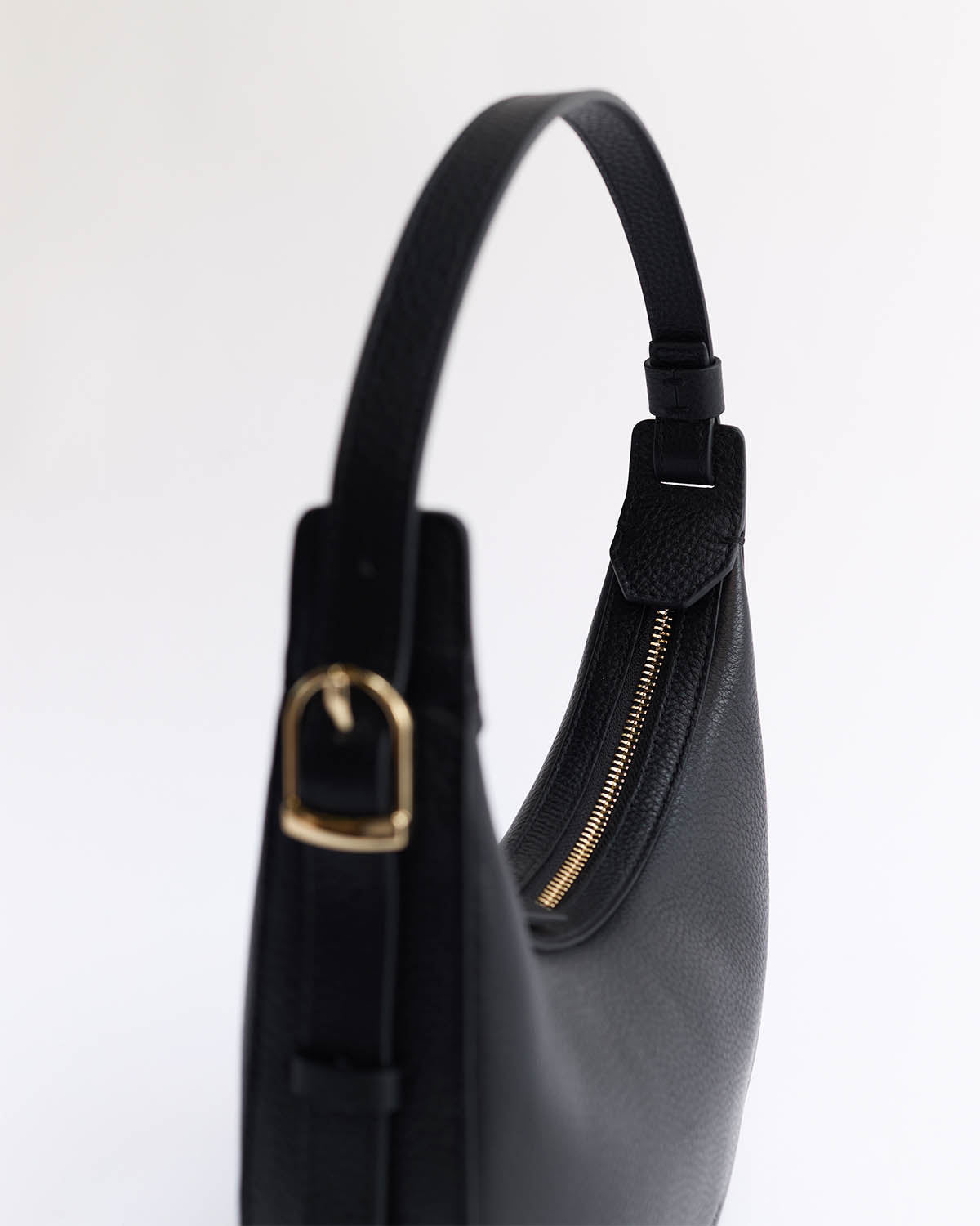 Friday Bag: Leather Crescent Bag in Black with Gold | The Horse